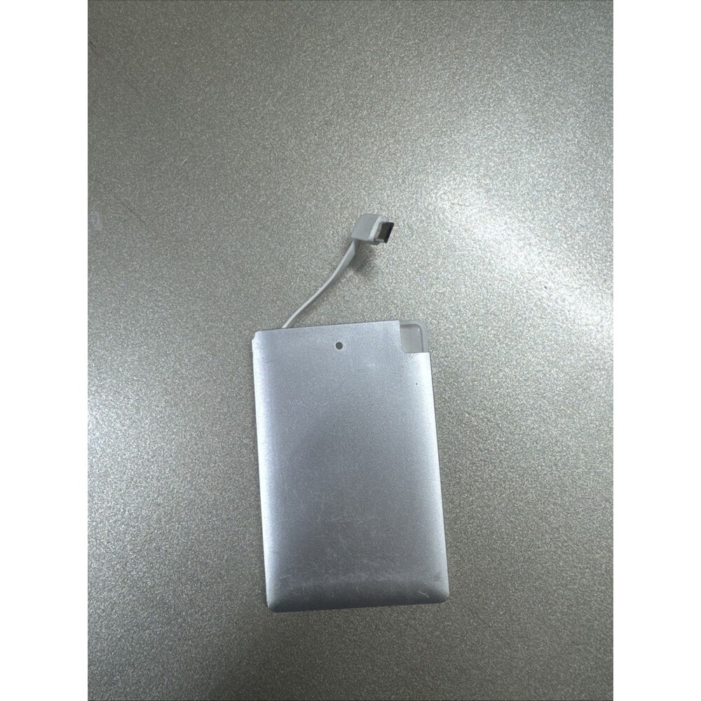 Ultra Slim portable charger silver with looks like Micro-USB cord see photos